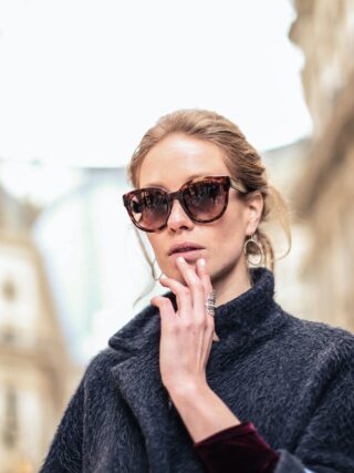 woman wearing sustainable sunglasses