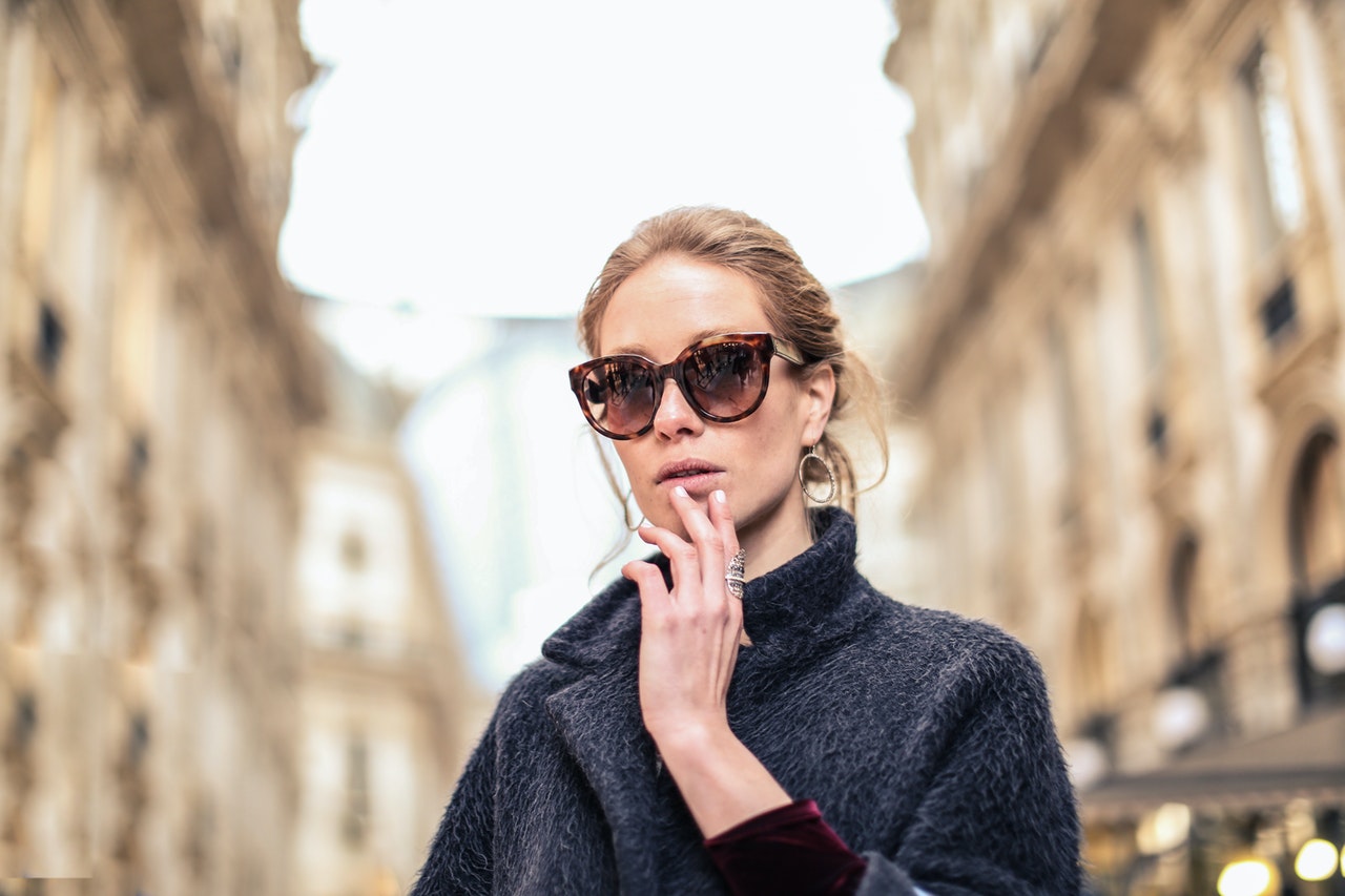 woman wearing sustainable sunglasses